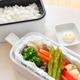 Illustration for article titled Double-Decker Bento Box Rice Cooker Promises Hot and Fresh Work Lunches That Rival Take Out
